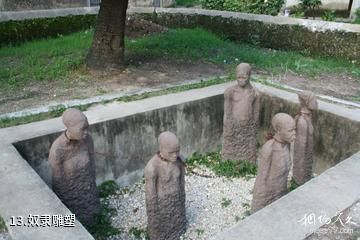 坦桑尼亚桑给巴尔石头城-奴隶雕塑照片